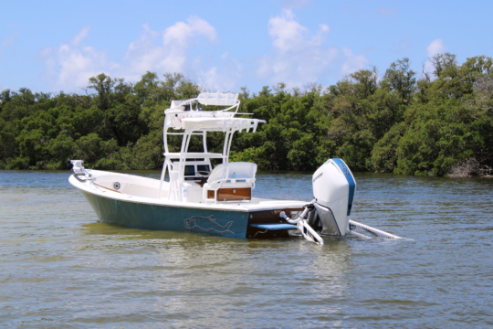 Custom Gause Built Gulf Coast center console boat running in coastal water